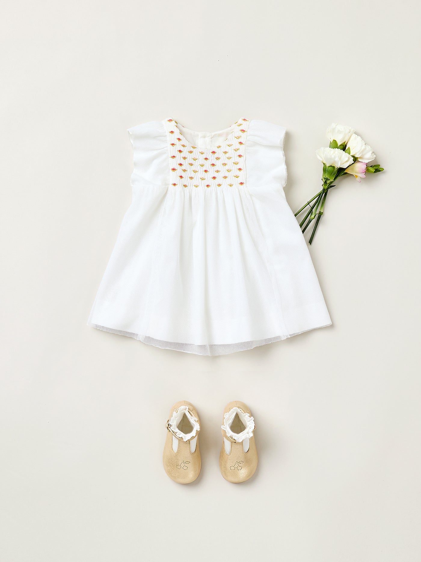 Summer 2025 Baby girl's look - White dress with embroidered smocks