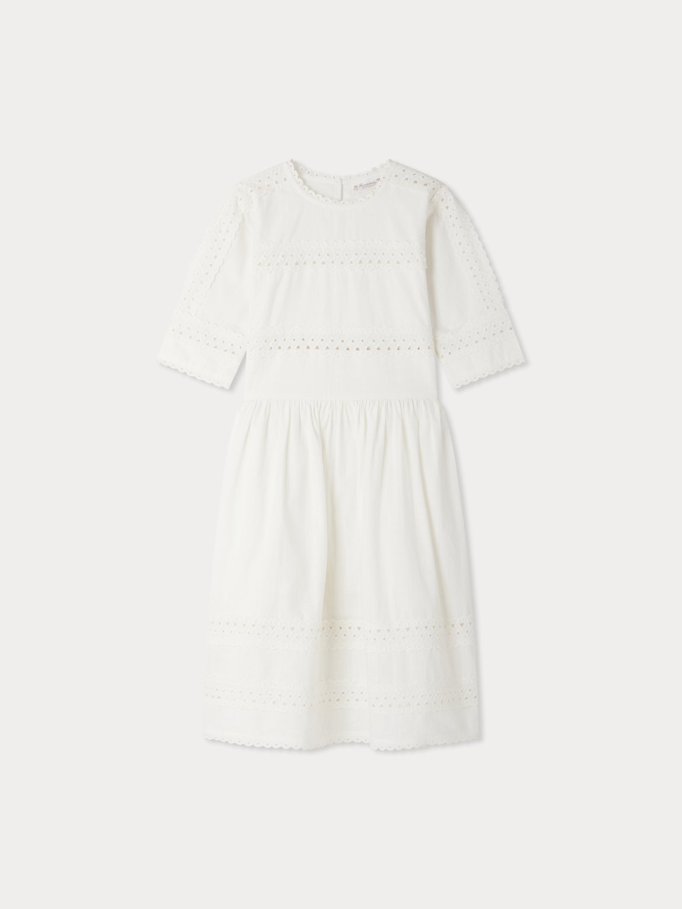 Elesa dress with crossed embroideries