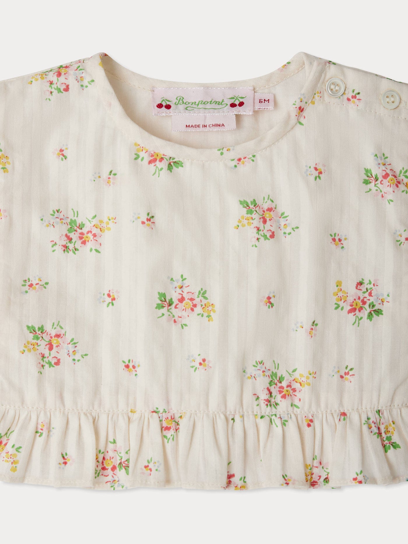 Removable ruffled collar with floral print