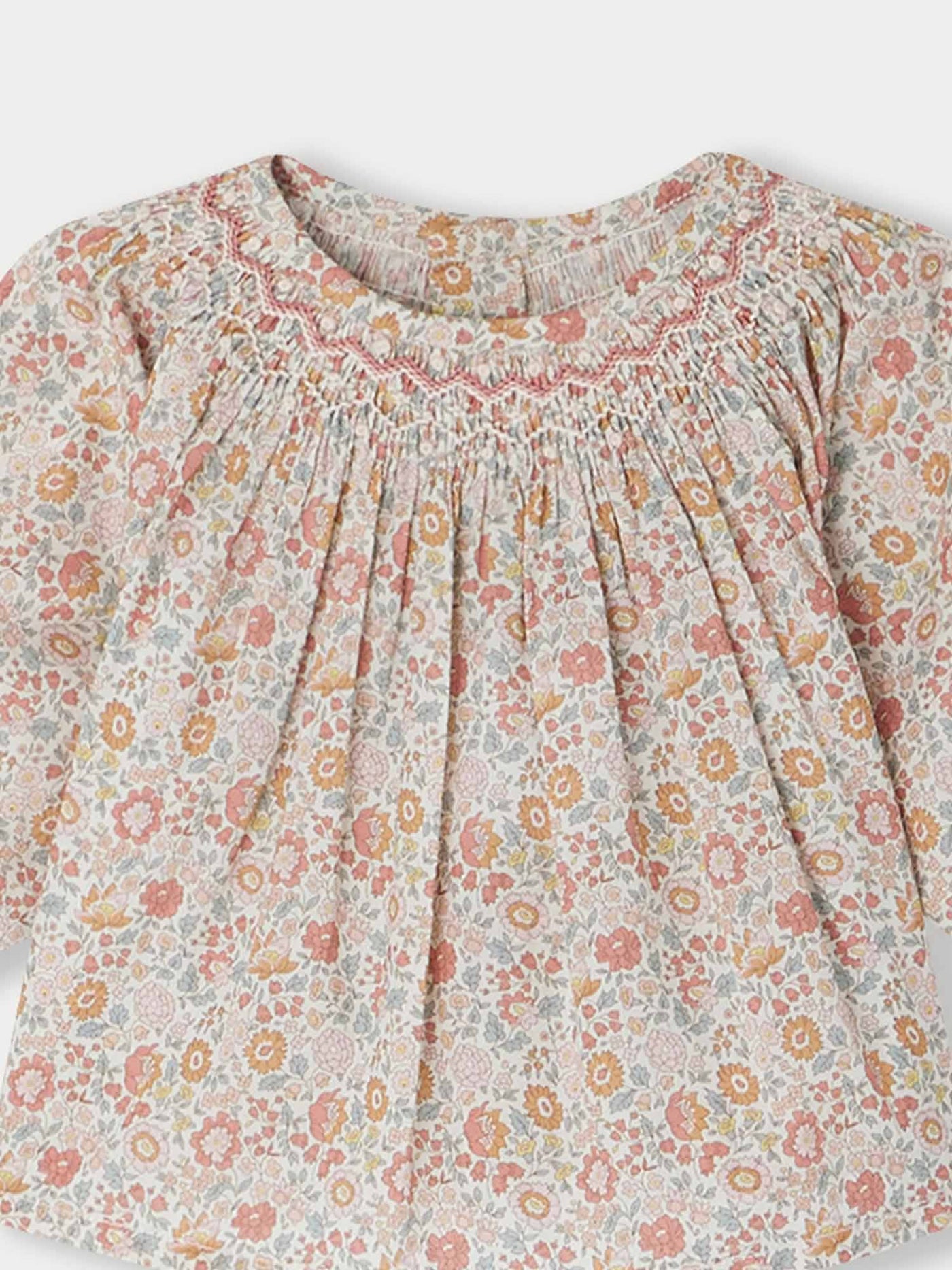 Griotte Bluse aus orangefarbenem Liberty-Stoff